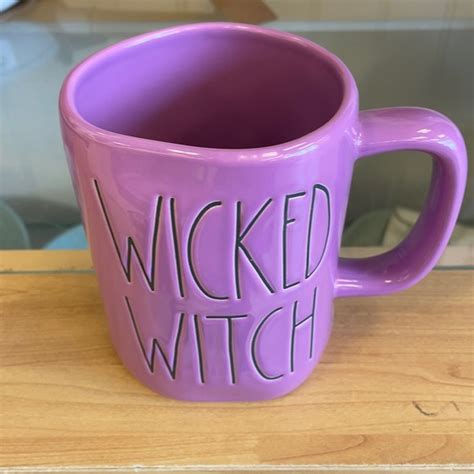 Cracking the Wisdom: The Wicked Witch Rae Dinn Mug's Riddles